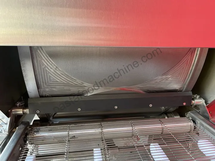 Discharge Scraper